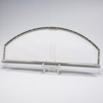 Gray lint filter is half-moon in shape, measuring approximately 1...